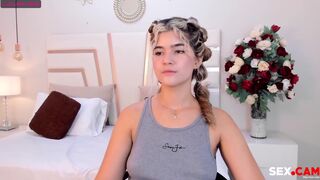 University bitch with pony tails shows shows us her perfect boobs.