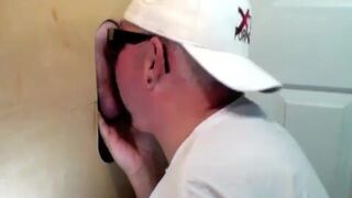Lustful dude with glasses enjoys in a glory hole scene