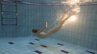 See a mesmerizing Russian teen Nastya underwater