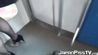 Japanese brunette  close up peeing in train