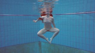 Beautiful Polish teen Alice swimming without clothes on