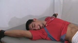 Ticklish & hot soccer player is bound on the table