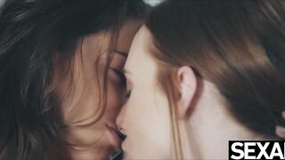 Watch this cute redhead & hot brunette eat each other's cunt