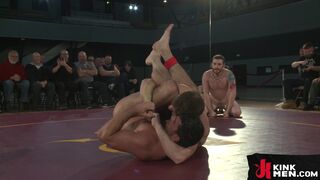 Muscular wrestlers can't handle each other during the round